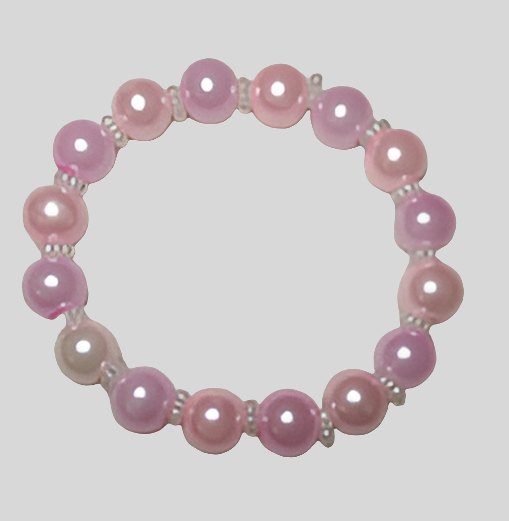 Bracelet en perles de verre rose bonbon avec des perles d'espacement